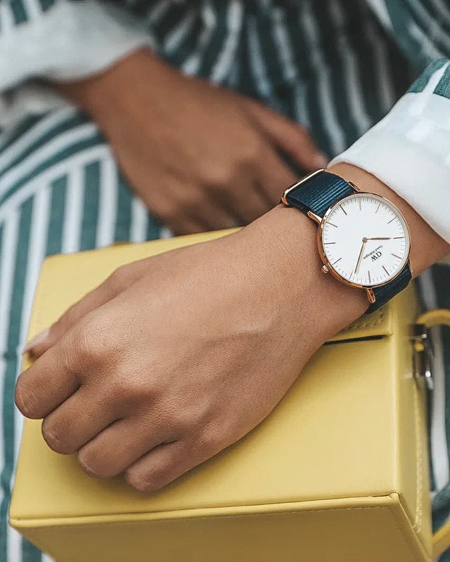 Rose gold women's watch with black NATO band